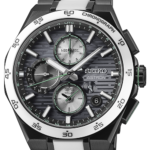 Seiko SSH185 Astron limited edition black titanium GPS Solar watch with white ceramic bracelet details and green dial accents.